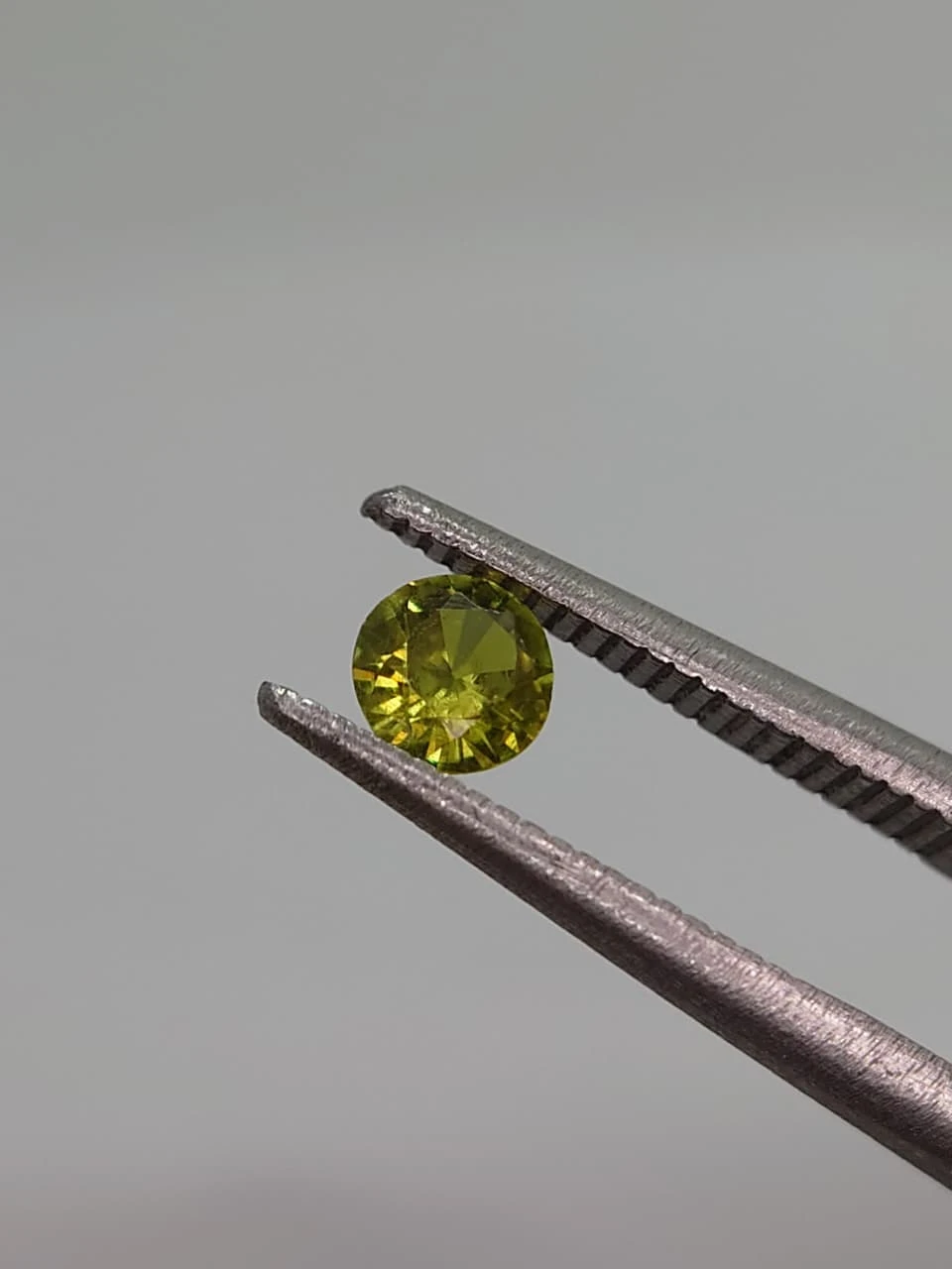 0.3ct Round Faceted Demantoid Garnet from Pakistan — view 1